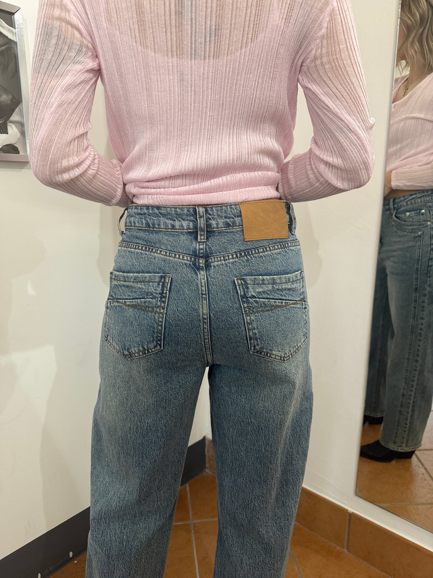 Jeans sabbiati cuciture