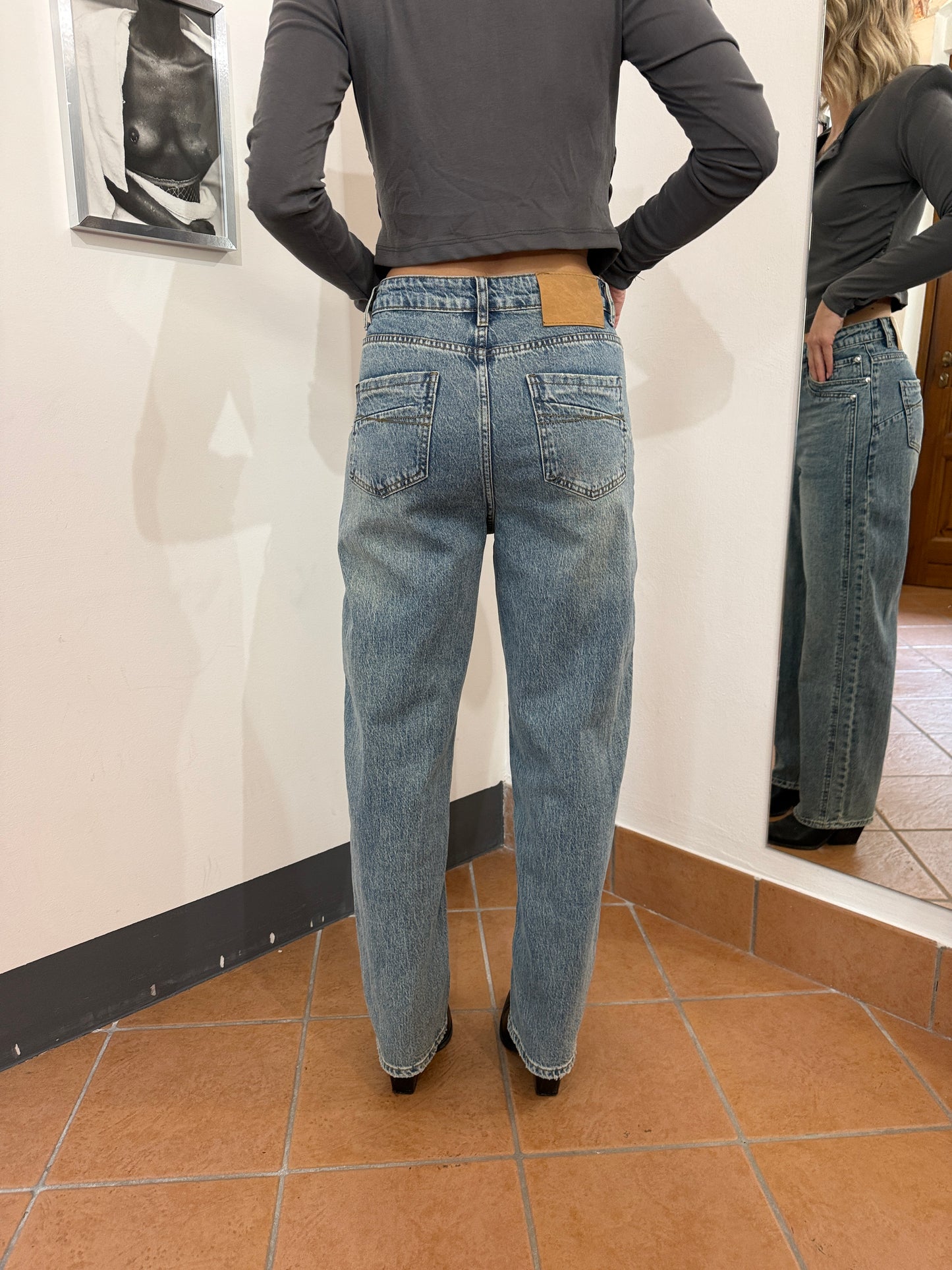 Jeans sabbiati cuciture